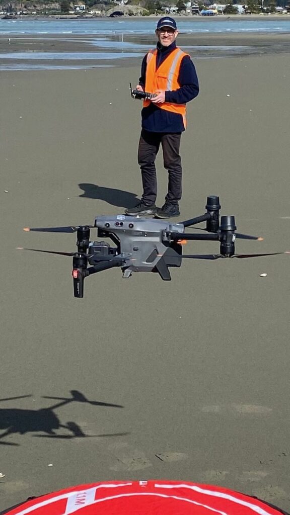 Daniel flying a drone
