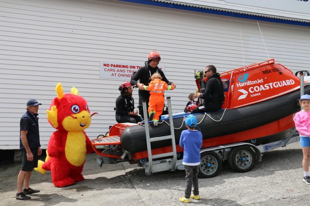 Visitors beside rescue vessel